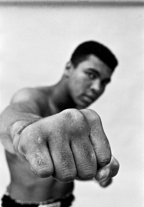 USA. Chicago 1966. Muhammad Ali, boxing world heavy weight champion showing off his right fist. © Thomas Hoepker / Magnum Photos